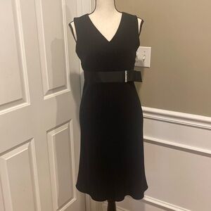 Like new worn once Ann Taylor stunning black dress size 2P.